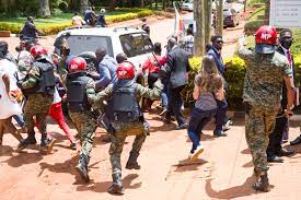 Military Police beating and chasing journalists.