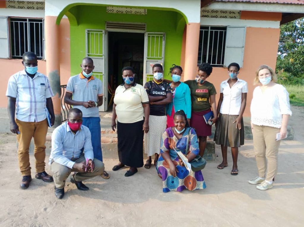 WHRDs of the Albertine Regional Network take a photo with the Total NGO and Human Rights Manager Mary Begg-Saffar after their meeting on 30th August 2021