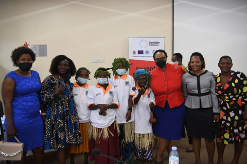 Some of the women human rights defenders from the Batwa tribe having a picture with UN Women representatives at the launch.