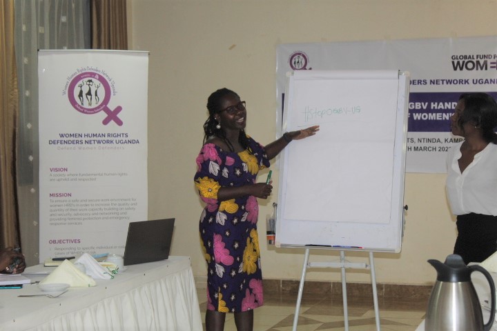 Peace Amuge speaks during launch of Online GBV handbook for WHRDS