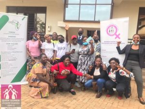 Group photo of WHRDNU secreteriat members with members of Queer Women Leaders Uganda at ACTV Uganda offices