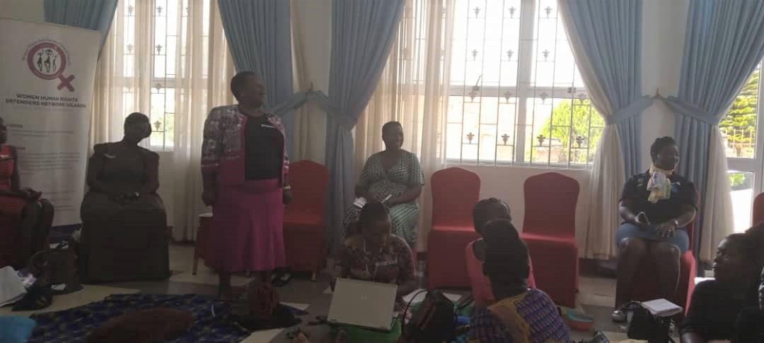 The district focal person Beatrice Rukanyanga giving her opening remarks