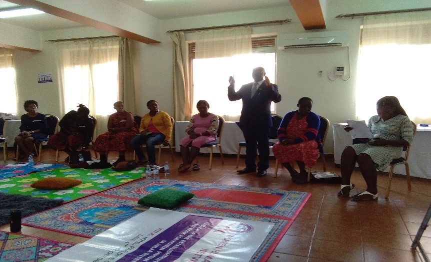 Mr. Lokyaza Moses giving an introductory remark during the meeting