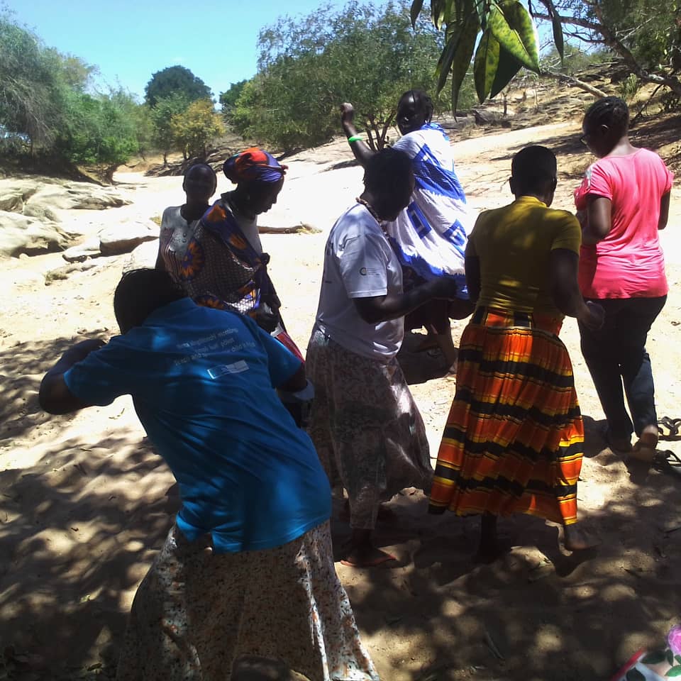 Women human rights defenders dancing and relaxing as a form of self care