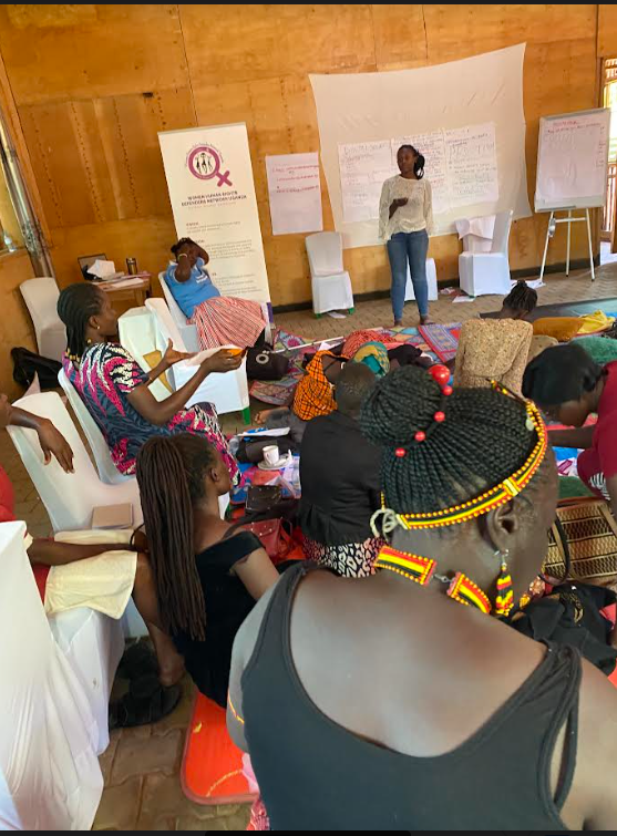 Joan Namulondo of WHRDN-U, facilitating a session on digital security management